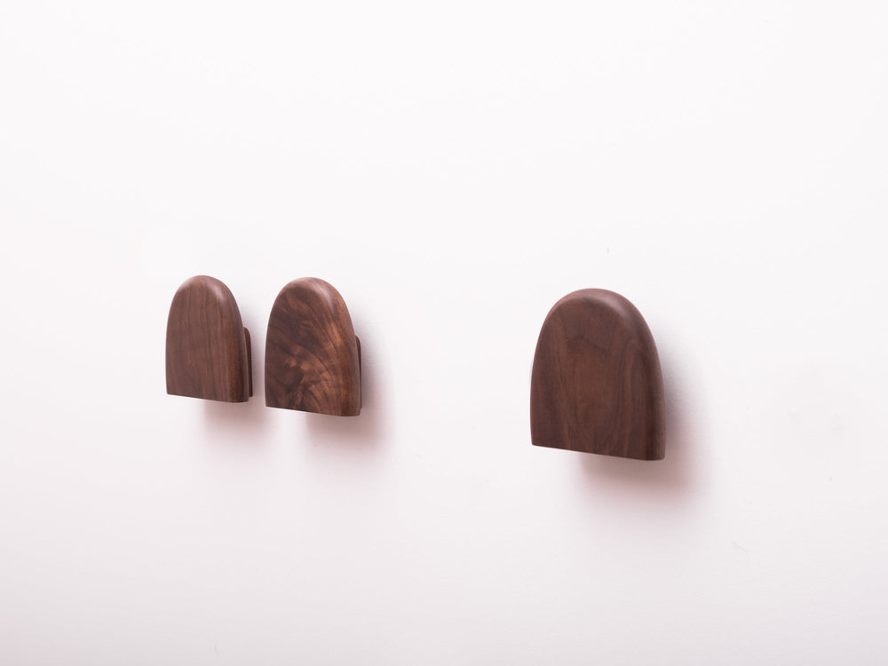 Delta wall hooks in walnut